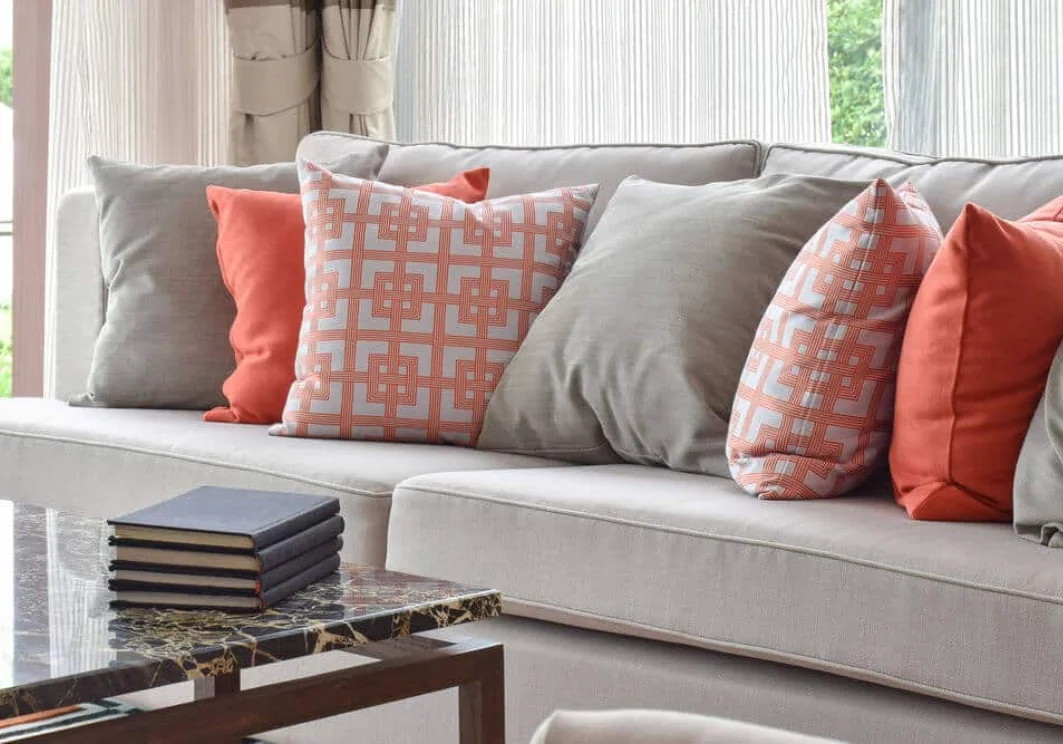 Assorted outdoor cushions in various colors