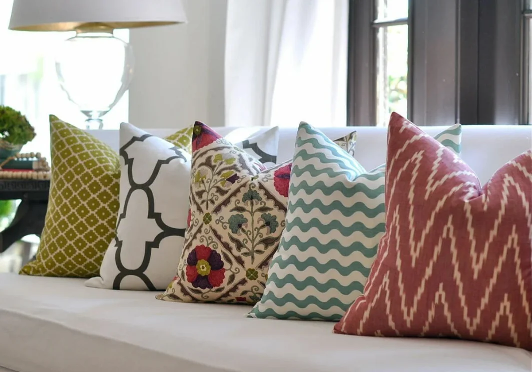 Golden-yellow cushion cover on sofa